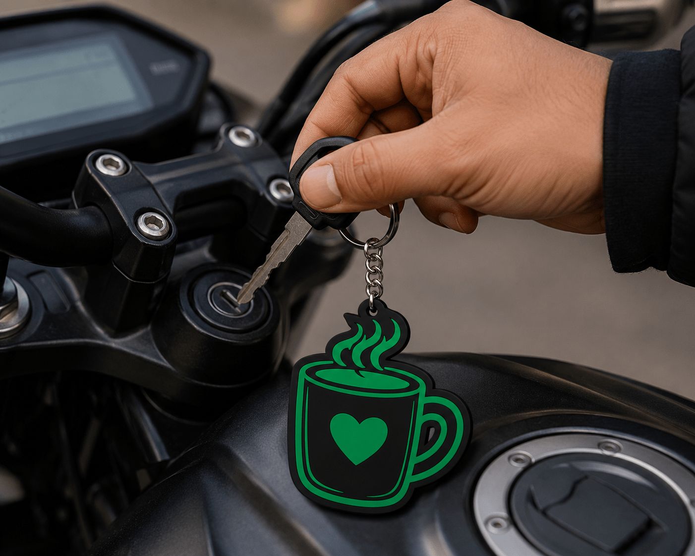 Hand inserting bike key with black green acrylic coffee mug keychain attached, gift for coffee lovers