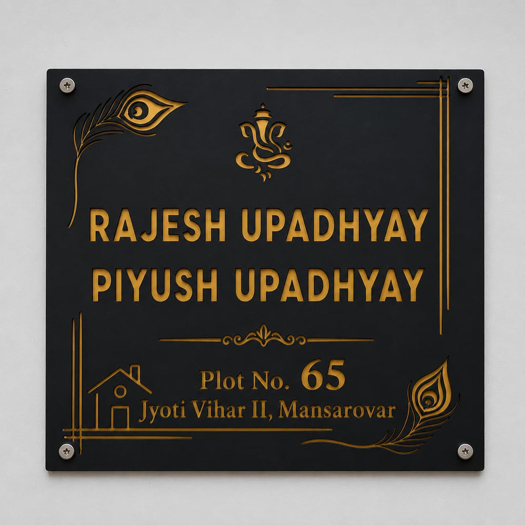 Debossed black acrylic name plate with gold mirror backing and Ganesha design