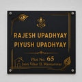 Debossed black acrylic name plate with gold mirror backing and Ganesha design