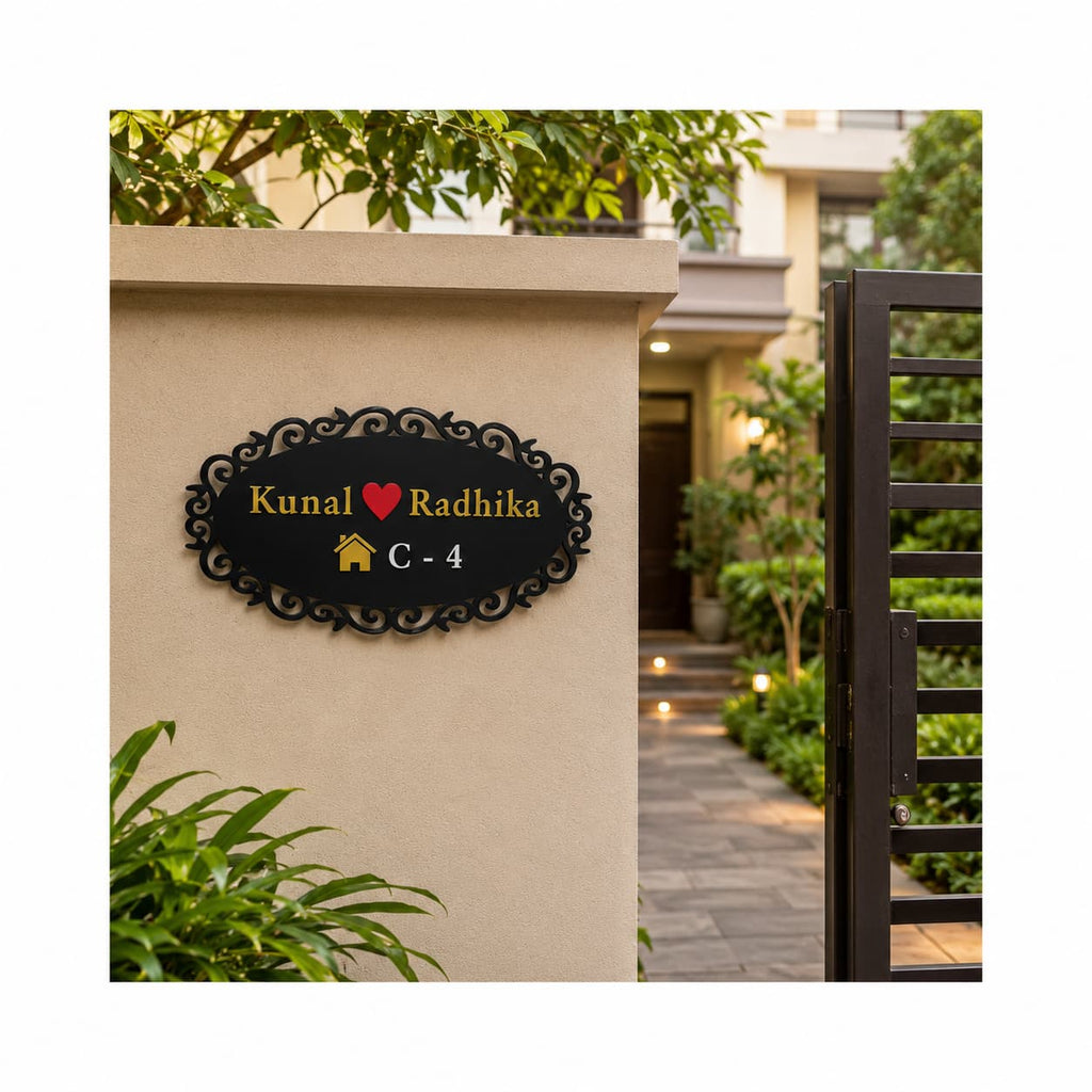 Black acrylic couple name plate with golden mirror names red heart and white house number mounted at apartment entrance wall by 11gifts