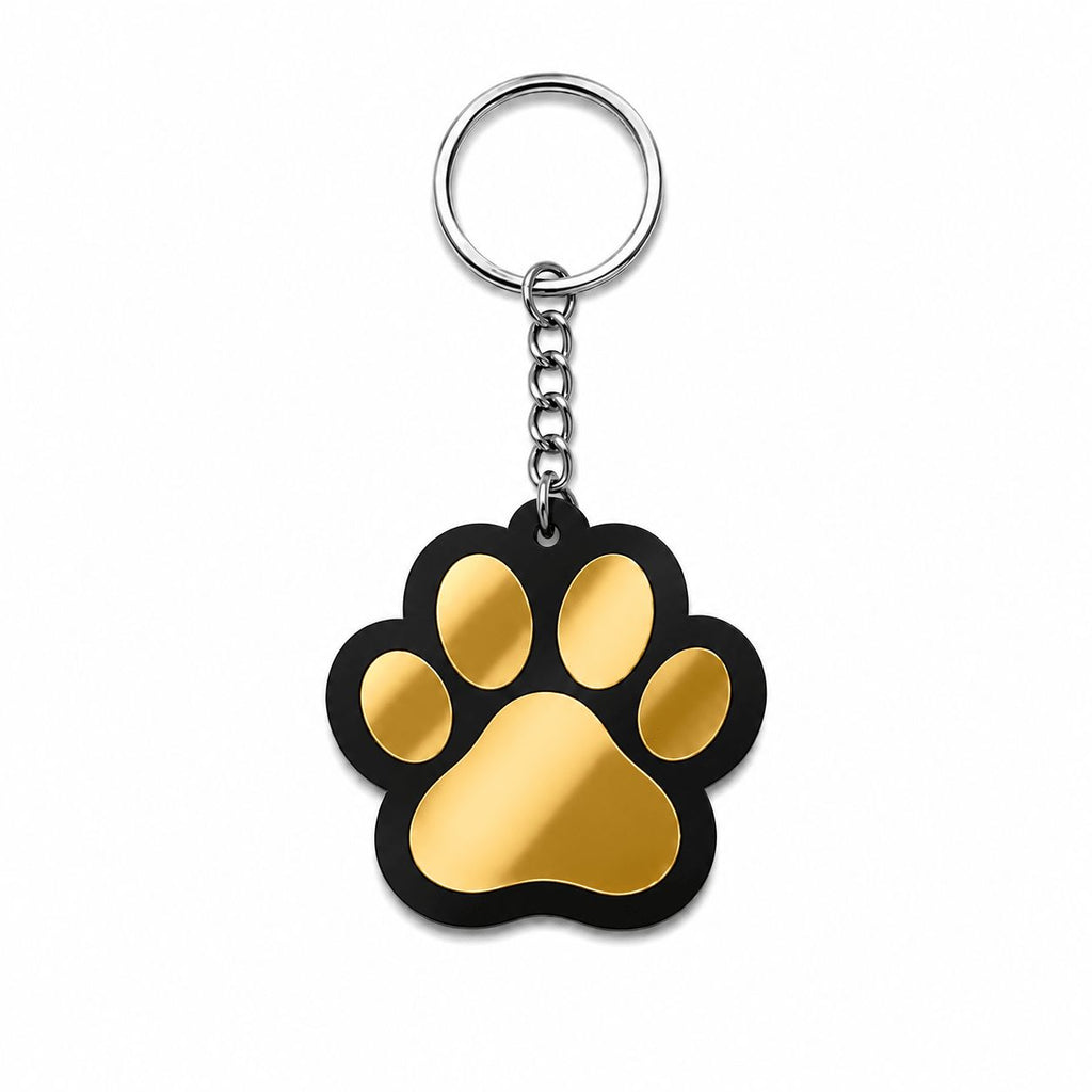 Black acrylic paw print keychain with gold mirror design and silver steel key ring, made in India
