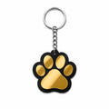 Black acrylic paw print keychain with gold mirror design and silver steel key ring, made in India