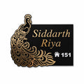 Premium black acrylic peacock name plate with golden mirror design, custom family name and house number for home entrance.