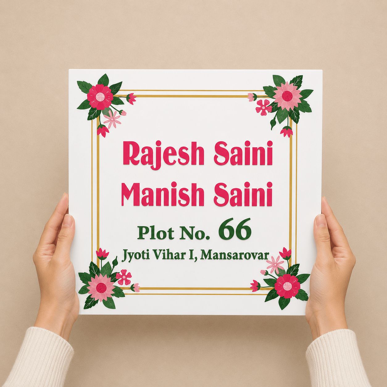Person holding personalised square acrylic name plate with corner floral design – custom name plate for apartment door, ideal housewarming gift India