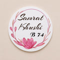 Round white acrylic name plate with pink lotus and leaf floral UV print design for couples, India