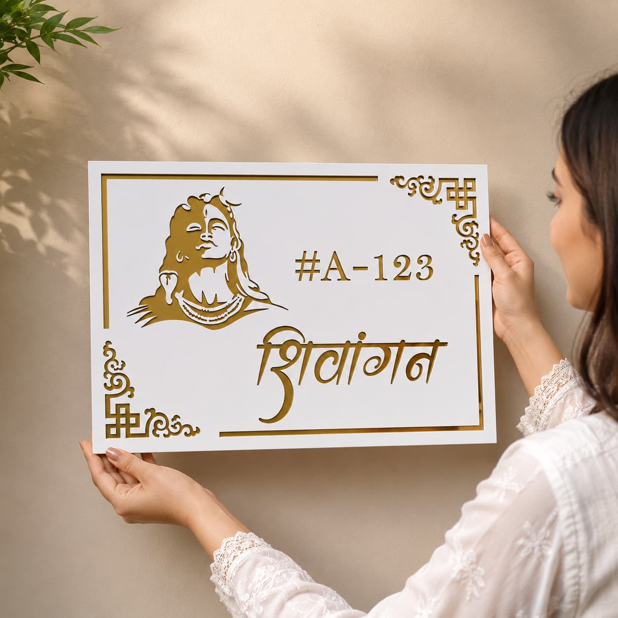 Woman holding Shiva white acrylic gold mirror name plate for size reference – 11gifts